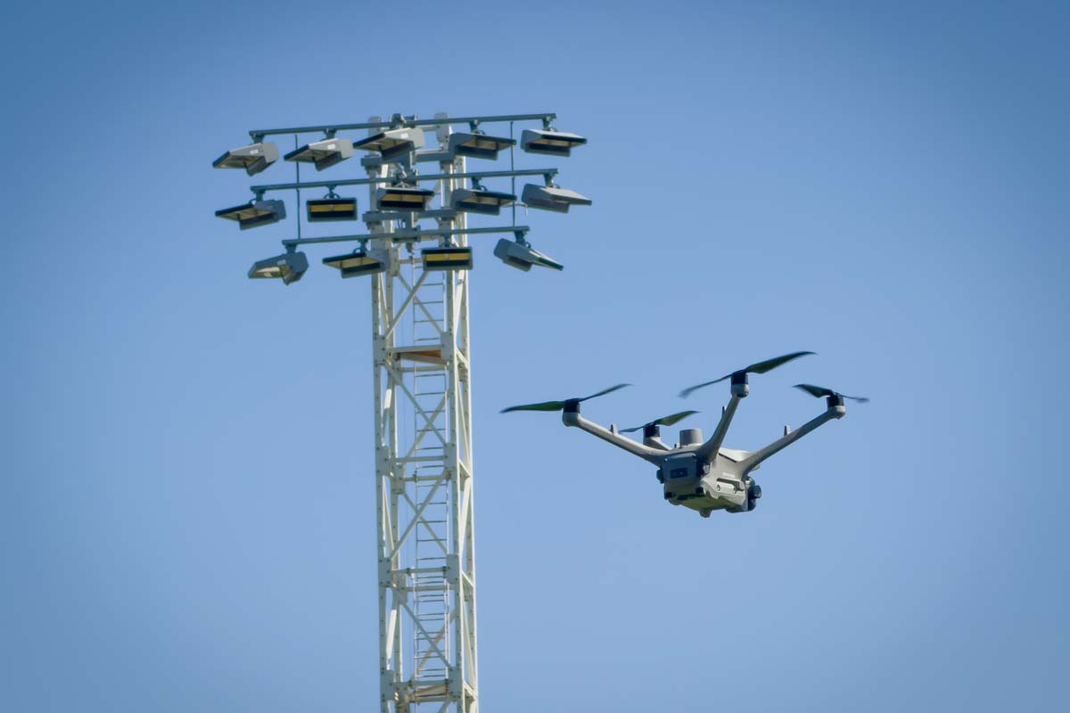 Floodlight pylon head inspected by drone with no work at height