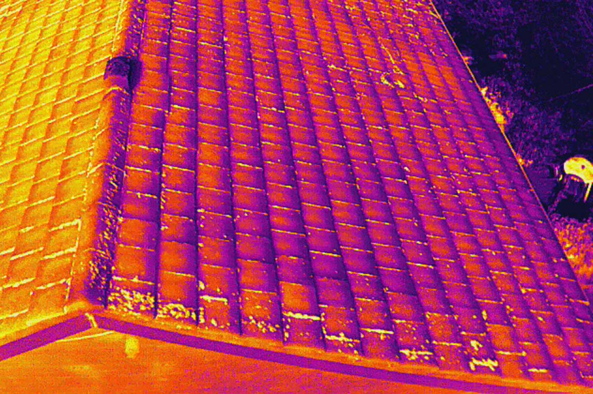 Drone thermal imaging survey capturing roof heat loss and anomalies